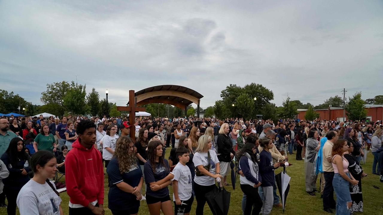 Community members, students, and faculty of Apalachee High School came together for a vigil on Friday. Picture: Megan Varner/Getty Images/AFP