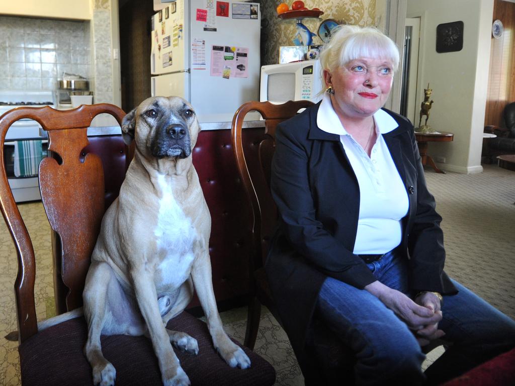 Brothel owner madam Stormy Summers at her Blair Athol home with her dog Doof.