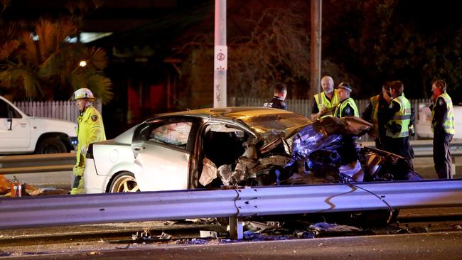 Emergency services attend the scene of a triple fatal car accident on Ipswich Rd Moorooka. Picture: AAP Image/Steve Pohlner