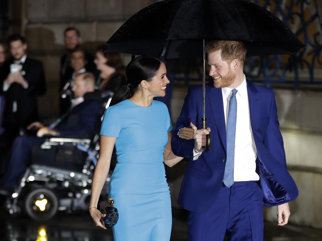 Meghan and Harry on one of their final engagements. Picture: Kirsty Wigglesworth/AP