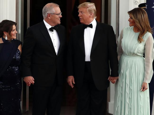 President Donald Trump and first lady Melania Trump stand with Prime Minister Scott Morrison and his wife Jenny Morrison in the White House. Picture: AP