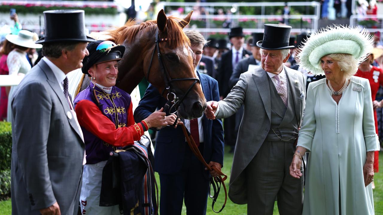 Trainer William Haggas with Tom Marquand celebrate the victory of Desert Hero in the King George V Stakes with King Charles III and Queen Camilla. Picture: Alex Pantling–Getty Images)