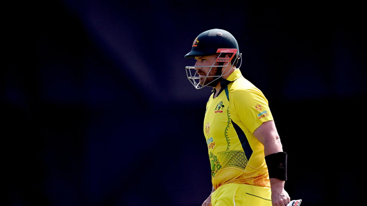 Australia's captain Aaron Finch walks off after being dismissed during the third one-day international (ODI) cricket match between Australia and Zimbabwe at the Riverway Stadium in Townsville on September 3, 2022. (Photo by William WEST / AFP) / -- IMAGE RESTRICTED TO EDITORIAL USE - STRICTLY NO COMMERCIAL USE --