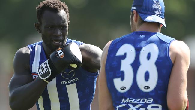 Majak Daw boxes with Tristan Xerri.