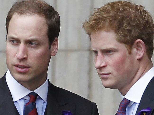 (FILES) In this file photo taken on June 05, 2012 Britain's Prince William (L) and Prince Harry (R) talks as they leave Saint Paul's Cathedral after a national service of thanksgiving for the Queen’s Diamond Jubilee in London on June 5, 2012. - Prince Harry, who became the father of a "very healthy boy" on Monday, has transformed himself from an angry young man into one of the British royal family's greatest assets. (Photo by Ian KINGTON / AFP)