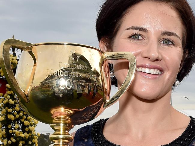 Melbourne Cup Day. Michelle Payne with the Melbourne Cup at the end of the day. Picture: Jay Town. Tuesday November 3, 2015. Melbourne, Australia. MelbourneCup15