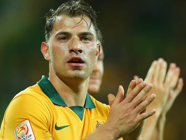 MELBOURNE, AUSTRALIA - JANUARY 09: James Troisi of Australia acknowledges the crowd after Australia won the 2015 Asian Cup match between the Australian Socceroos and Kuwait at AAMI Park on January 9, 2015 in Melbourne, Australia. (Photo by Quinn Rooney/Getty Images)