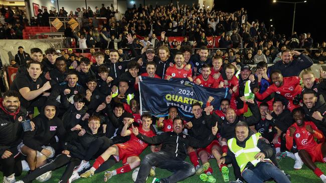 Hume City players, staff and fans celebrate progress to the Australia Cup quarter-final.