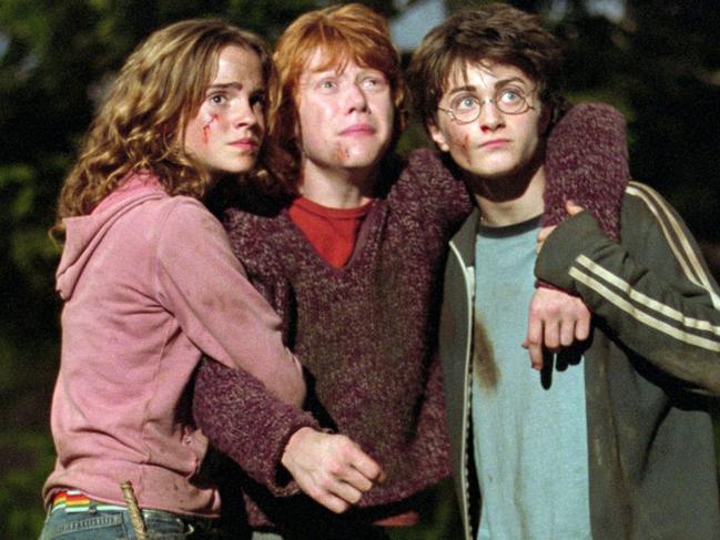 Actor Emma Watson with Rupert Grint and Daniel Radcliffe in scene from film 'Harry Potter and the Prisoner of Azkaban'.