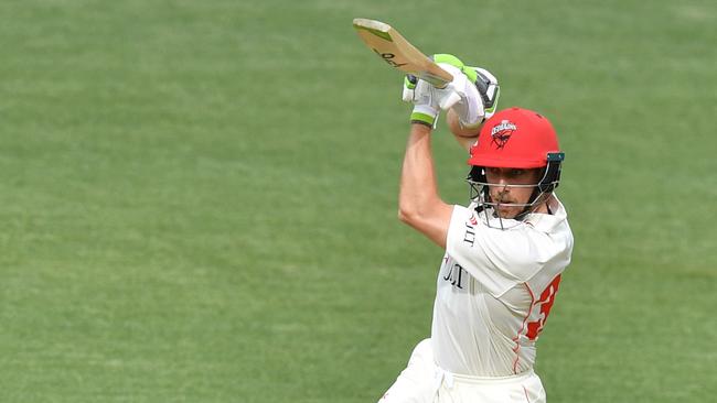 Jake Lehmann of the Redbacks plays a shot on his way to leading SA to a draw against NSW in last week’s Sheffield Shield clash. Picture: AAP Image/David Mariuz