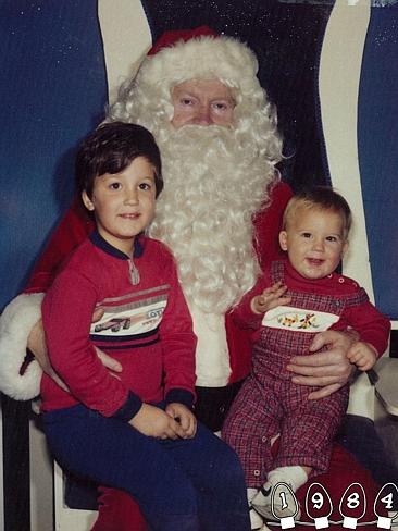 1984 ... Martin joins his older brother Mike and Santa. Picture: Martin Gray 