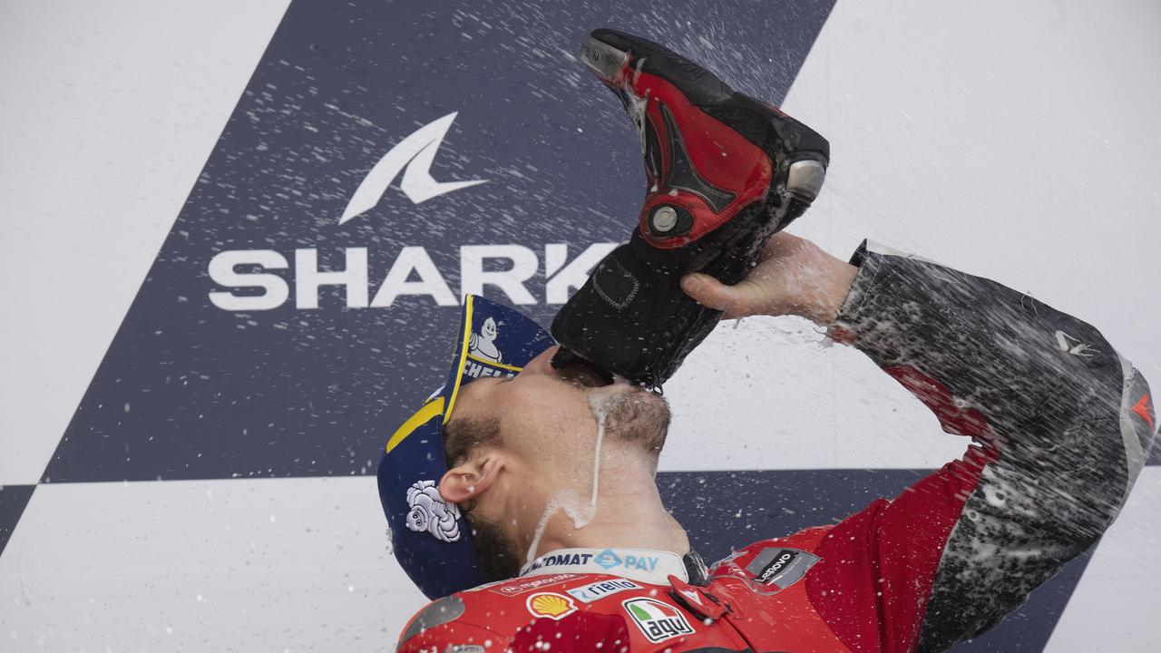Jack Miller celebrates the victory on the podium. (Photo by Mirco Lazzari gp/Getty Images)