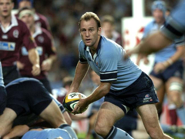 Waratahs 7/05/05 N,S,W Waratahs v Queensland Reds at Aussie Stadium. Waratahs end the nine year drought against the Reds by winning 27- 8 and secure a home semi final berth. Photo by Craig WilsonWaratah Captain Chris Whitaker played his 100th game.