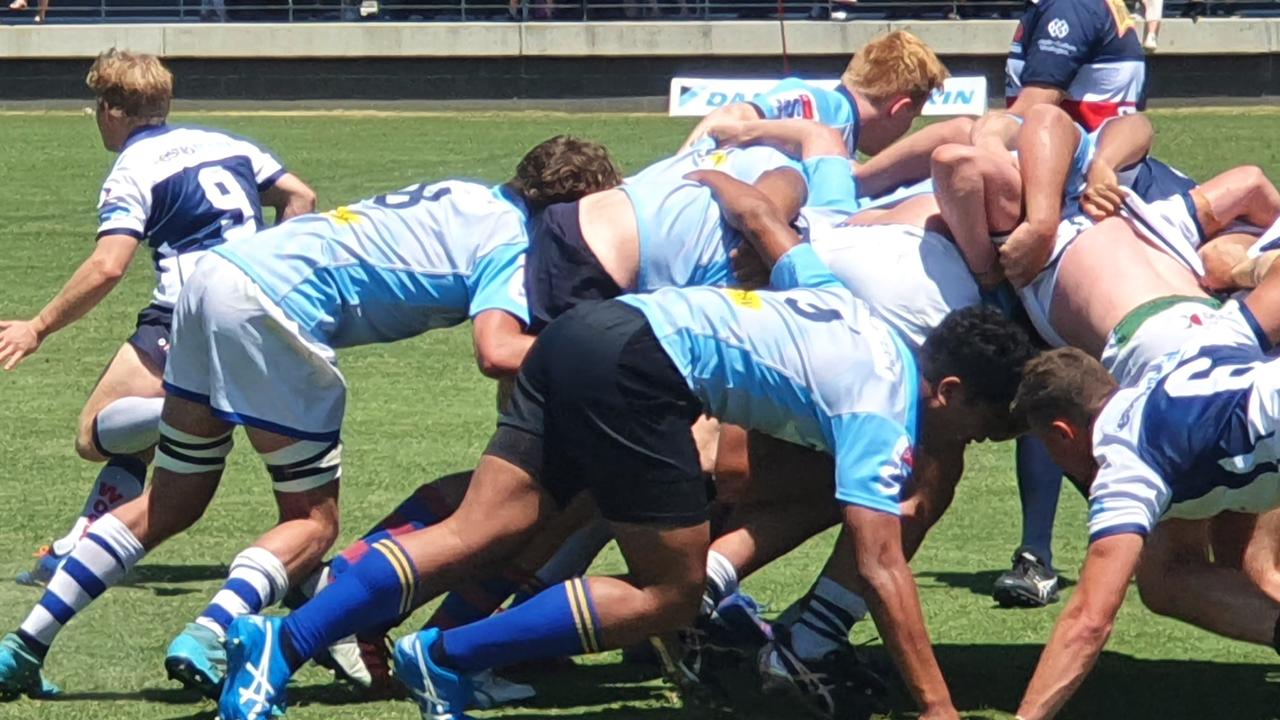 Action in the match between the Gen Blues Junior and a Schools Selection side.