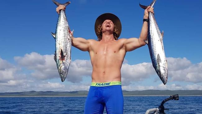 Nick Cummins poses with the plenty of fish in the sea.