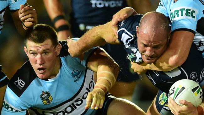 NQ Cowboys against Cronulla Sharks at 1300 Smiles Stadium. Sharks Paul Gallen and Cowboys Matthew Scott. Picture: Evan Morgan