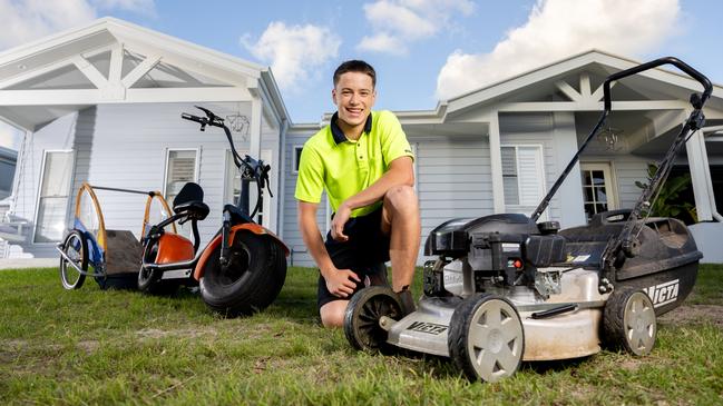 Jett Paludan, 15, runs a successful lawn care business in Casuarina. Picture: Luke Marsden