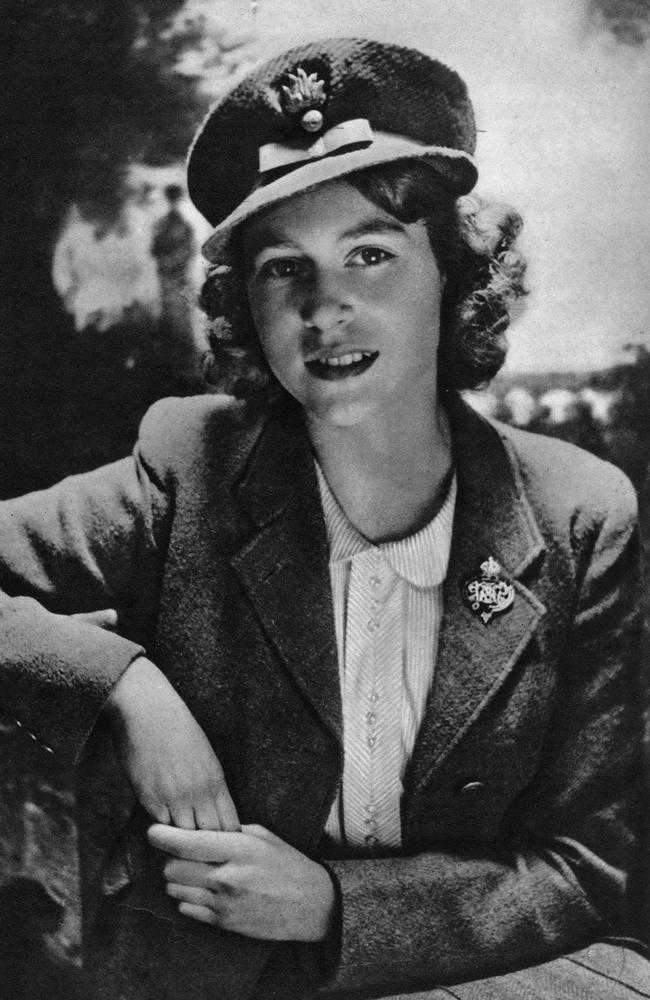 1942: Princess Elizabeth, sitting for a portrait in the Bow Room at Buckingham Palace, shows her Royal Highness wearing the insignia of the Grenadier Guards. Picture: Alamy