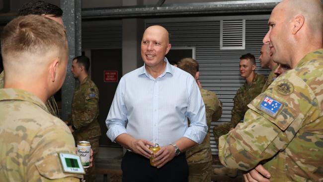 Peter Dutton speaks with military personnel at Lavarack Barracks in Townsville. Picture: Max Bree