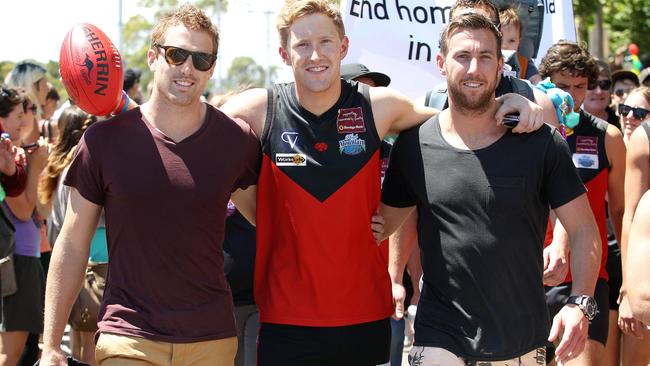 Pride March in St Kilda . Richmond player Daniel Jackson , Yarra Glen Footballer Jason Ball who is gay and Carlton footballer Brock McLean