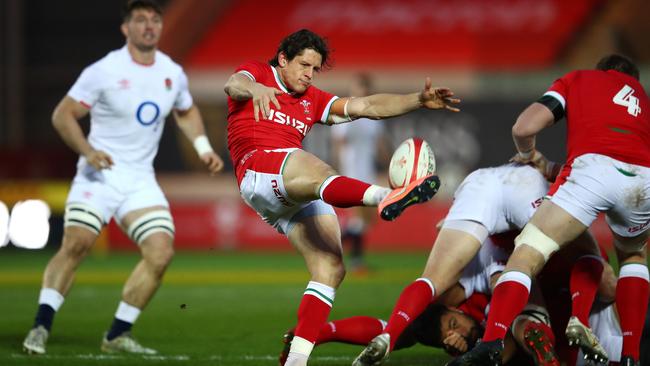 Wales’ Lloyd Williams kicks the ball clear during the Autumn Nations Cup match against England