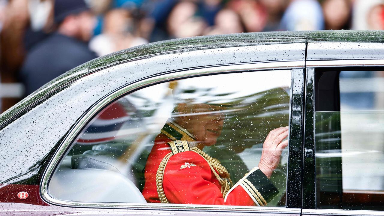 Britain's King Charles III waves as he arrives to Buckingham Palace. Picture: AFP