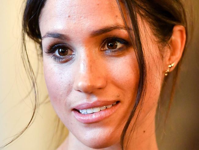 CARDIFF, WALES - JANUARY 18:  Meghan Markle chats with people inside the Drawing Room during a visit to Cardiff Castle on January 18, 2018 in Cardiff, Wales. (Photo by Ben Birchall - WPA Pool / Getty Images)