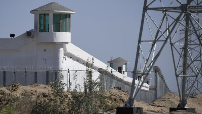 Watchtowers on a high-security facility near what is believed to be a re-education camp in China's northwestern Xinjiang region. Picture: AFP.