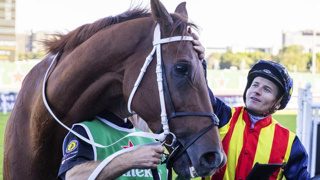 McDonald gives Nature Strip a pat after winning last year’s TJ Smith Stakes. Picture: Jenny Evans/Getty Images