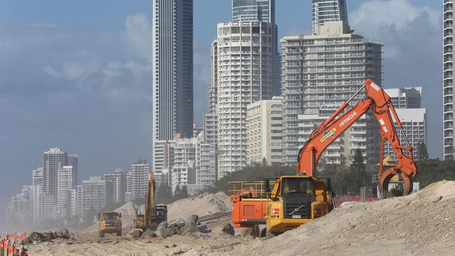 Earthmoving equipment at Narrowneck on the public seawall. Picture: Glenn Hampson.