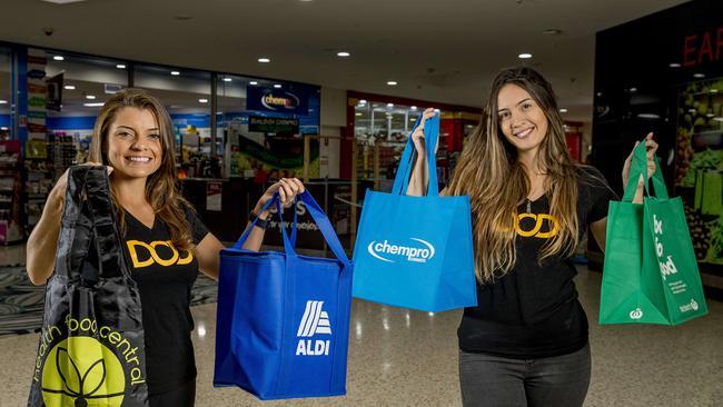 DOD (delivery on demand) personal shoppers, Alyne Reis and Stephanie Zumckeller at Stockland Burleigh. Picture: Jerad Williams