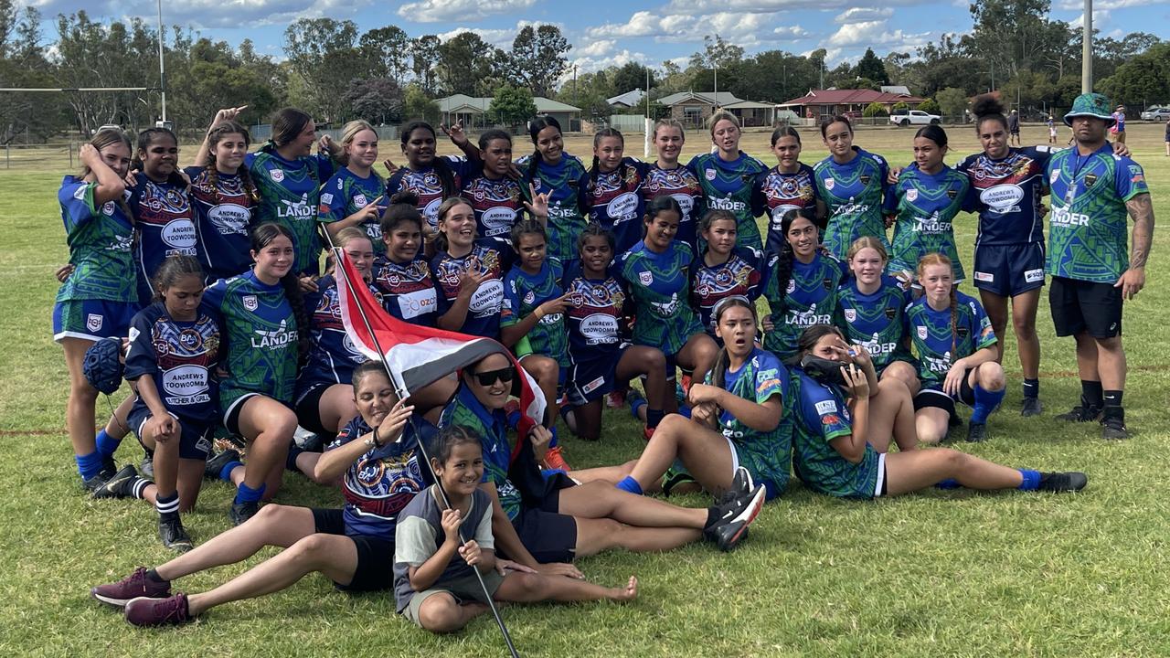 Southwest Qld Emus U15 girls and Pacific Nations U15 girls together after the match. Photo: Darcy Jennings