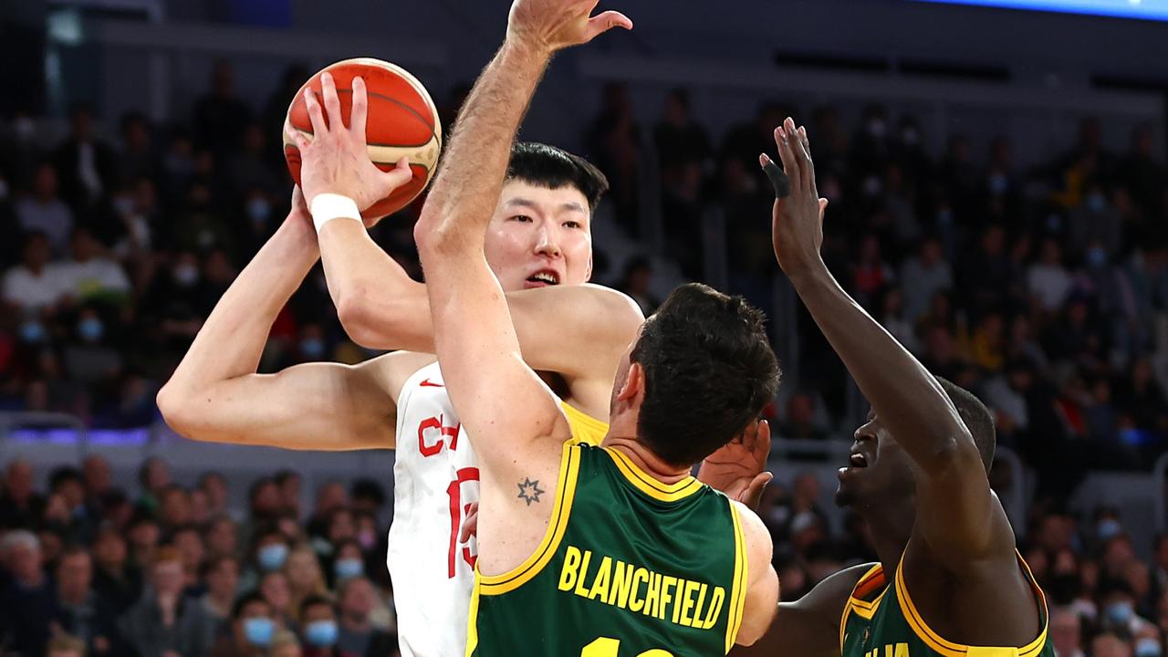 Qi Zhou is challenged during the FIBA World Cup Asian qualifier. Picture: Getty Images