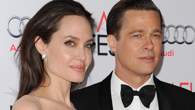 HOLLYWOOD, CA - NOVEMBER 05:  Angelina Jolie and Brad Pitt attend the premiere of 