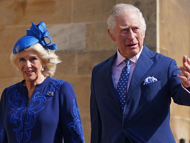 Britain's King Charles III (R) and Britain's Camilla, Queen Consort arrive for the Easter Mattins Service at St. George's Chapel, Windsor Castle on April 9, 2023. (Photo by Yui Mok / POOL / AFP)