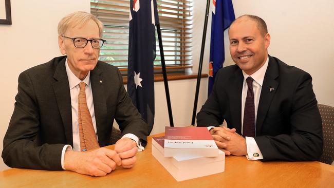 Commissioner Kenneth Hayne and Treasurer Josh Frydenberg with the final report from the Royal Commission into Misconduct in the Banking, Superannuation and Financial Services Industry, at Parliament House in Canberra. Picture: Kym Smith