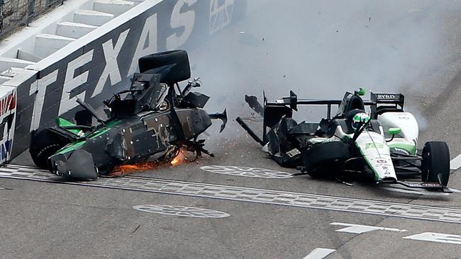 Newgarden’s car slides upside down towards the wall during the crash.