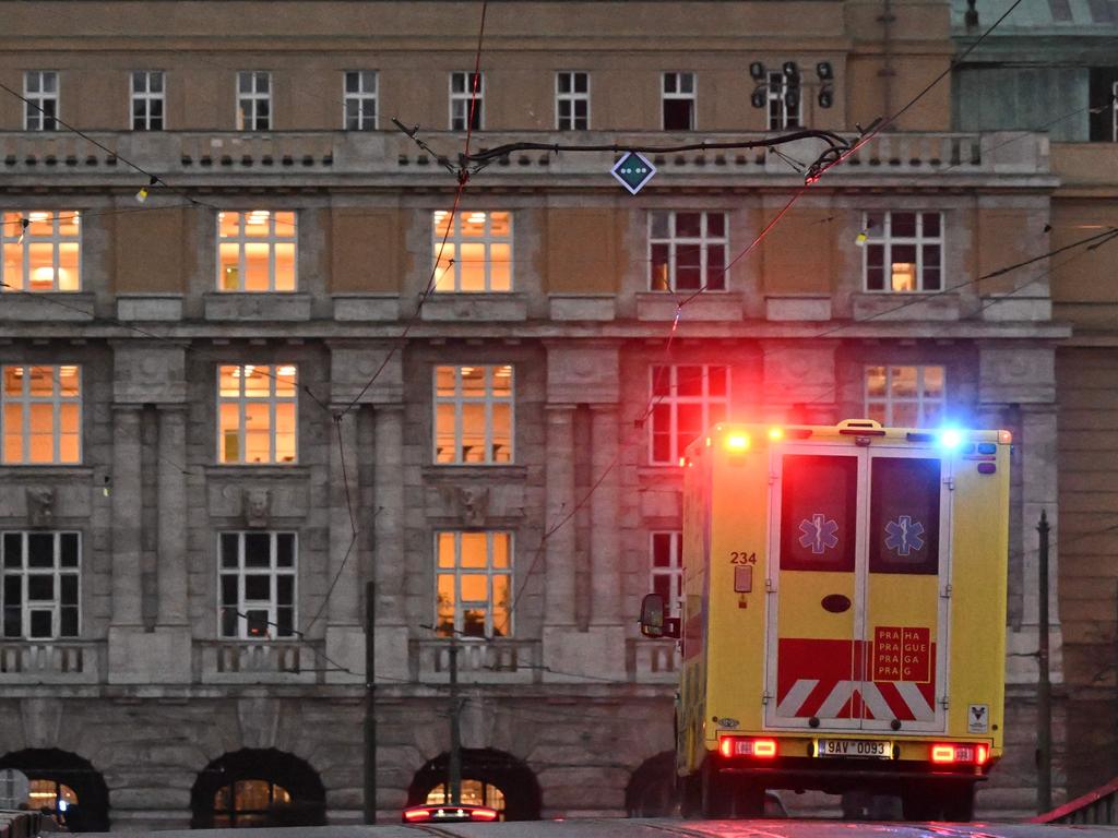 An ambulance drives over a bridge towards the Charles University in central Prague. Picture: Michal Cizek / AFP