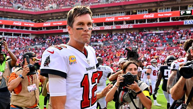 TAMPA, FLORIDA - OCTOBER 09: Tom Brady #12 of the Tampa Bay Buccaneers walks off the field after defeating the Atlanta Falcons 21-15 at Raymond James Stadium on October 09, 2022 in Tampa, Florida.   Julio Aguilar/Getty Images/AFP