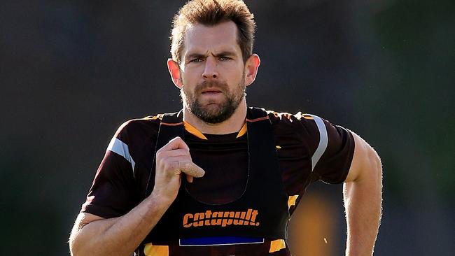 Luke Hodge pushes himself at Hawthorn training. Picture: Wayne Ludbey