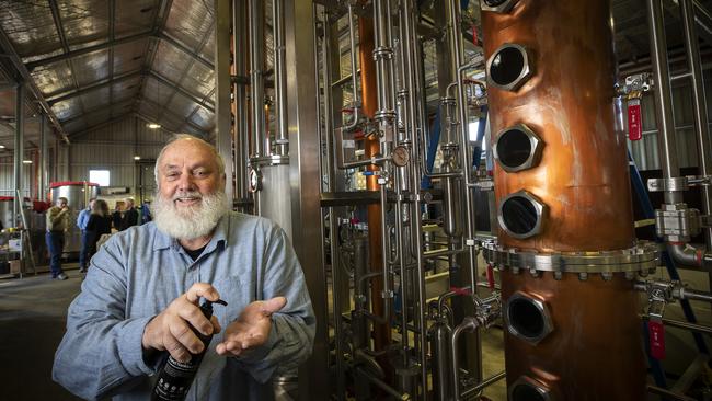 Lark Distilling co-founder and brand ambassador Bill Lark with the new column still, used for making hand sanitiser at their Cambridge distillery. Picture: Chris Kidd