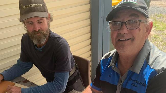 Baffle Creek Men's Shed members celebrate a monumental moment in the organisations history, the signing of a lease with Gladstone Regional Council for land to erect their new shed on.