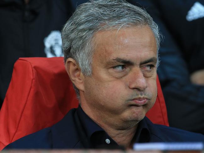 TOPSHOT - Manchester United's Portuguese manager Jose Mourinho reacts ahead of the Champions League group H football match between Manchester United and Valencia at Old Trafford in Manchester, north west England, on October 2, 2018. (Photo by Lindsey PARNABY / AFP)