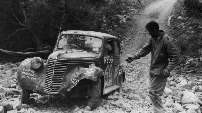 Motor racing – Redex Round Australia Trial 1955. Driver J Murray of Queensland drives over a boulder-strewn creek bed on the horror stretch from Marlborough to Sarina in Queensland.