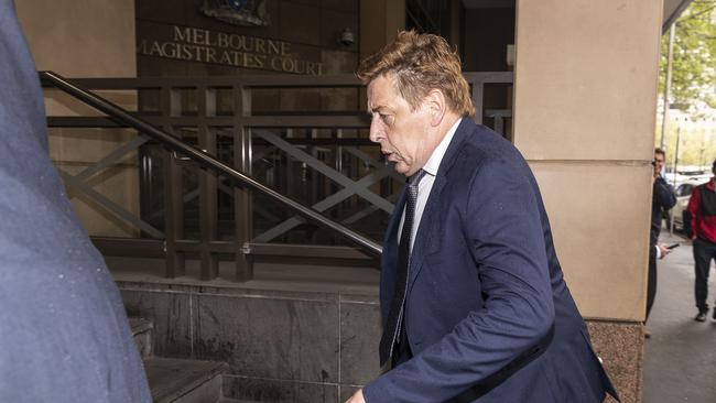 Thompson arriving at the Melbourne Magistrates Court this morning. Photo: AAP Image/Daniel Pockett