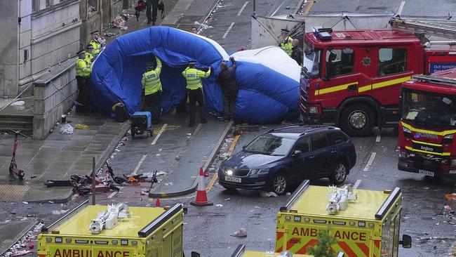 The car is surrounded by fire engines and ambulances. Picture: AP