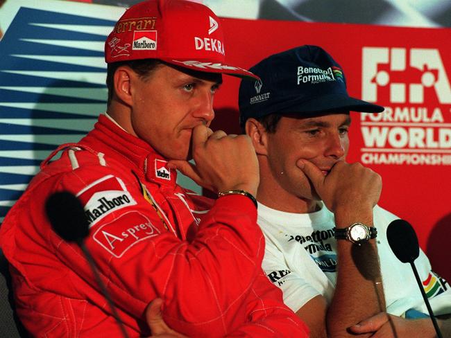 Michael Schumacher with Benetton F1 driver Gerhard Berger at Melbourne’s Albert Park in 1996.