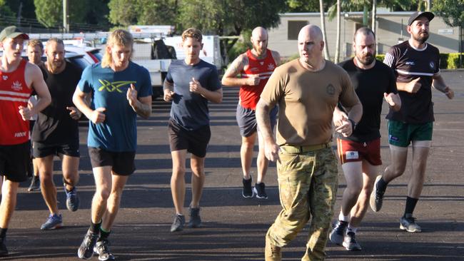 TOUGH TEAM: Battling the heat the Lismore Swans senior men's squad participated in a special training session at the 41st Battalion, Royal New South Wales Regiment, led by Bombardier Thomas Hart, on Tuesday March 10, 2021. Photo: Alison Paterson