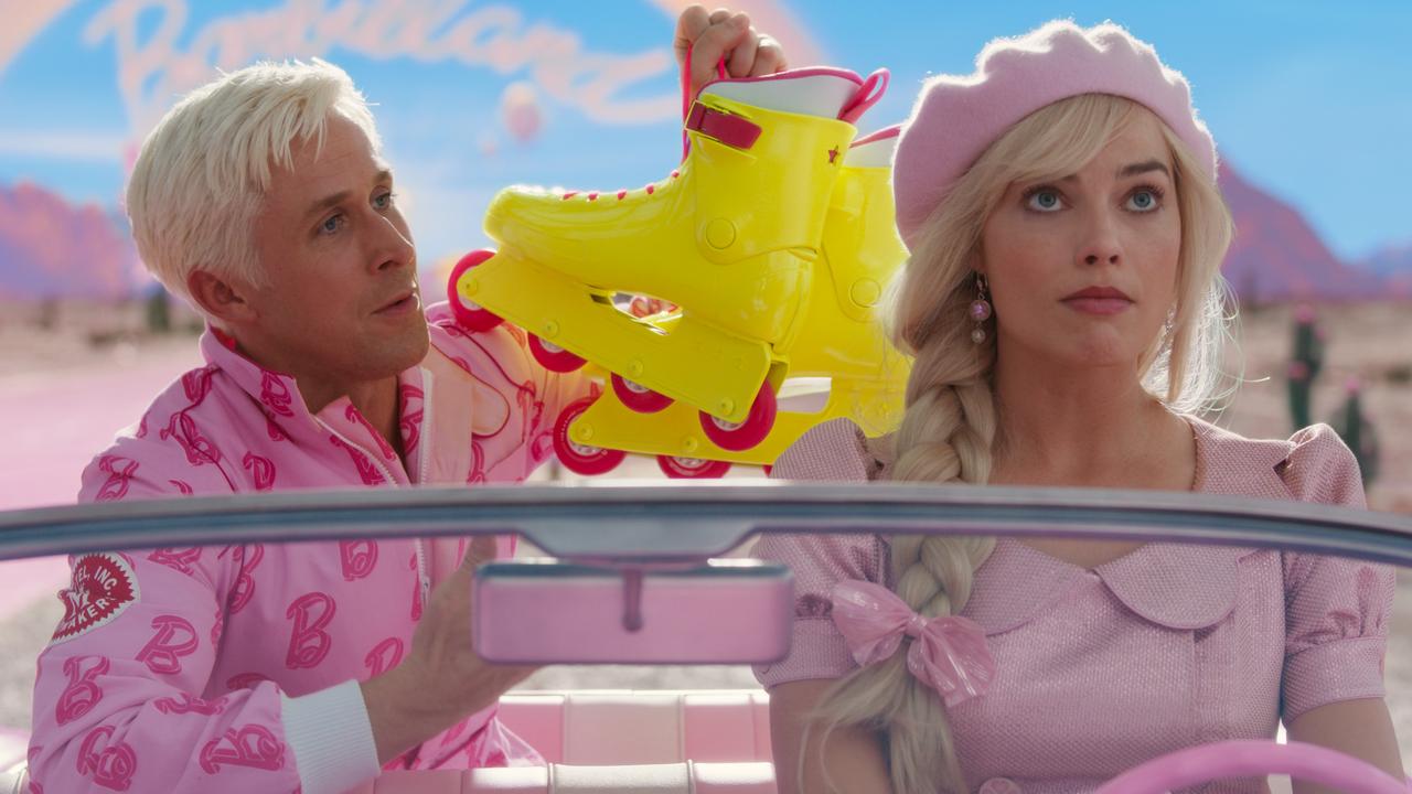 Ryan Gosling as Ken and Margot Robbie as Barbie in a scene from <i>Barbie</i>.