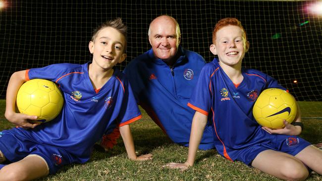 Sturt Lions president John Vander Veeken with club juniors. Picture: Stephen Laffer